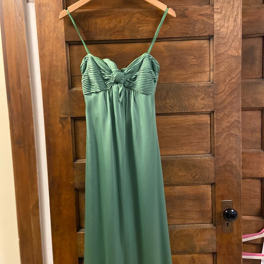 Never worn.  Gorgeous long BCBG Maxazria gown